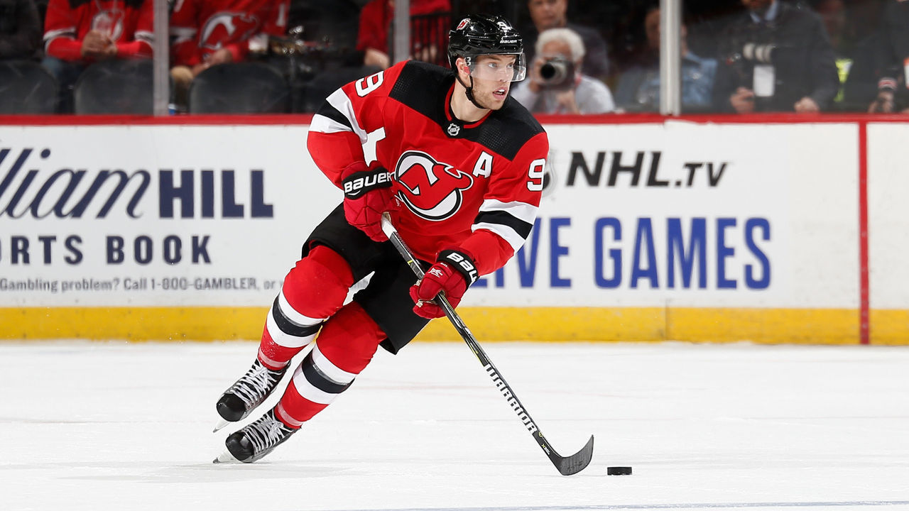 NEWARK, NJ - OCTOBER 19: Taylor Hall #9 of the New Jersey Devils skates with the puck against the Vancouver Canucks at the Prudential Center on October 19, 2019 in Newark, New Jersey.