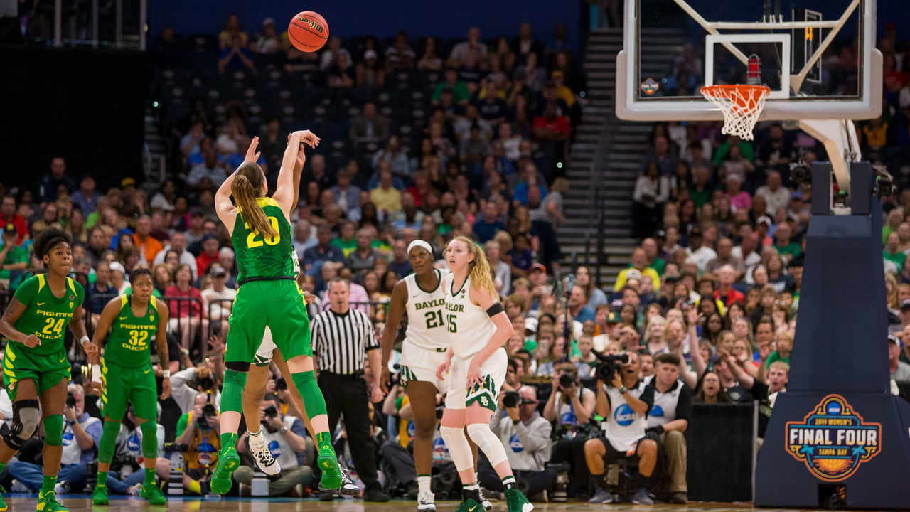 TAMPA, FL - APRIL 05: Oregon guard Sabrina Ionescu (20) is fouled while making a three point shot in 2019 NCAA Women's Division I Championship Final Four game between the Oregon Ducks and the Baylor Bears on April 05, 2019 at Amelie Arena in Tampa, FL.