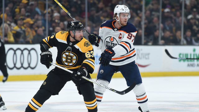 BOSTON, MA - OCTOBER 11: Brad Marchand #63 of the Boston Bruins against Connor McDavid #97 of the Edmonton Oilers at the TD Garden on October 11, 2018 in Boston, Massachusetts.