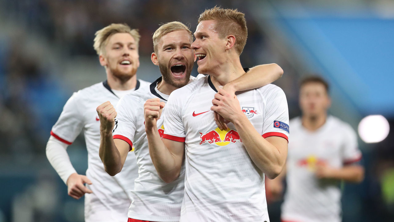 05 November 2019, Russia, St. Petersburg: Soccer: Champions League, Group stage, Group G, Matchday 4, Zenit St. Petersburg - RB Leipzig in St. Petersburg Stadium. Leipzig's Marcel Halstenberg (r-l), Konrad Laimer and Emil Forsberg cheer for an alleged goal, which was not recognized after video evidence. Photo: Jan Woitas/dpa