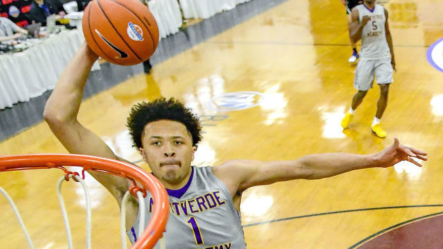 MIDDLE VILLAGE, NEW YORK - APRIL 05: Cade Cunningham #1 of Montverde Academy dunks the ball against IMG Academy in the semifinal of the GEICO High School National Tournament at Christ the King High School on April 05, 2019 in Middle Village, New York.