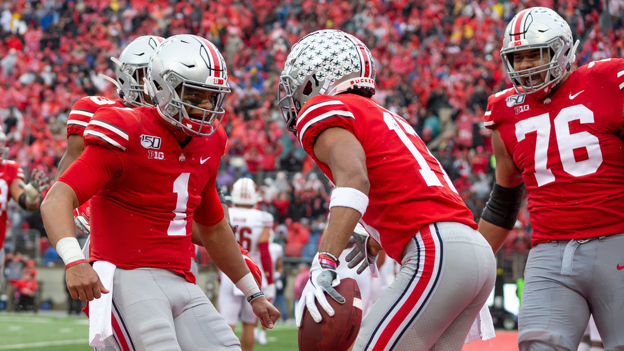 COLUMBUS, OH - OCTOBER 26: Chris Olave #17 of the Ohio State Buckeyes celebrates with Justin Fields #1 of the Ohio State Buckeyes after scoring a touchdown during game action between the Ohio State Buckeyes and the Wisconsin Badgers on October 26, 2019, at Ohio Stadium in Columbus, OH.
