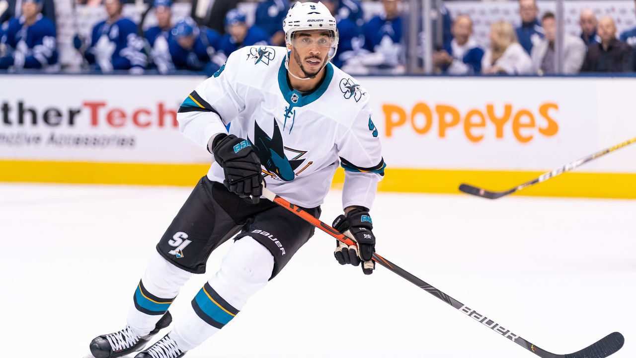 TORONTO, ON - OCTOBER 25: San Jose Sharks left wing Evander Kane #9 skates with the puck against the Toronto Maple Leafs during the first period at the Scotiabank Arena on October 25, 2019 in Toronto, Ontario, Canada.