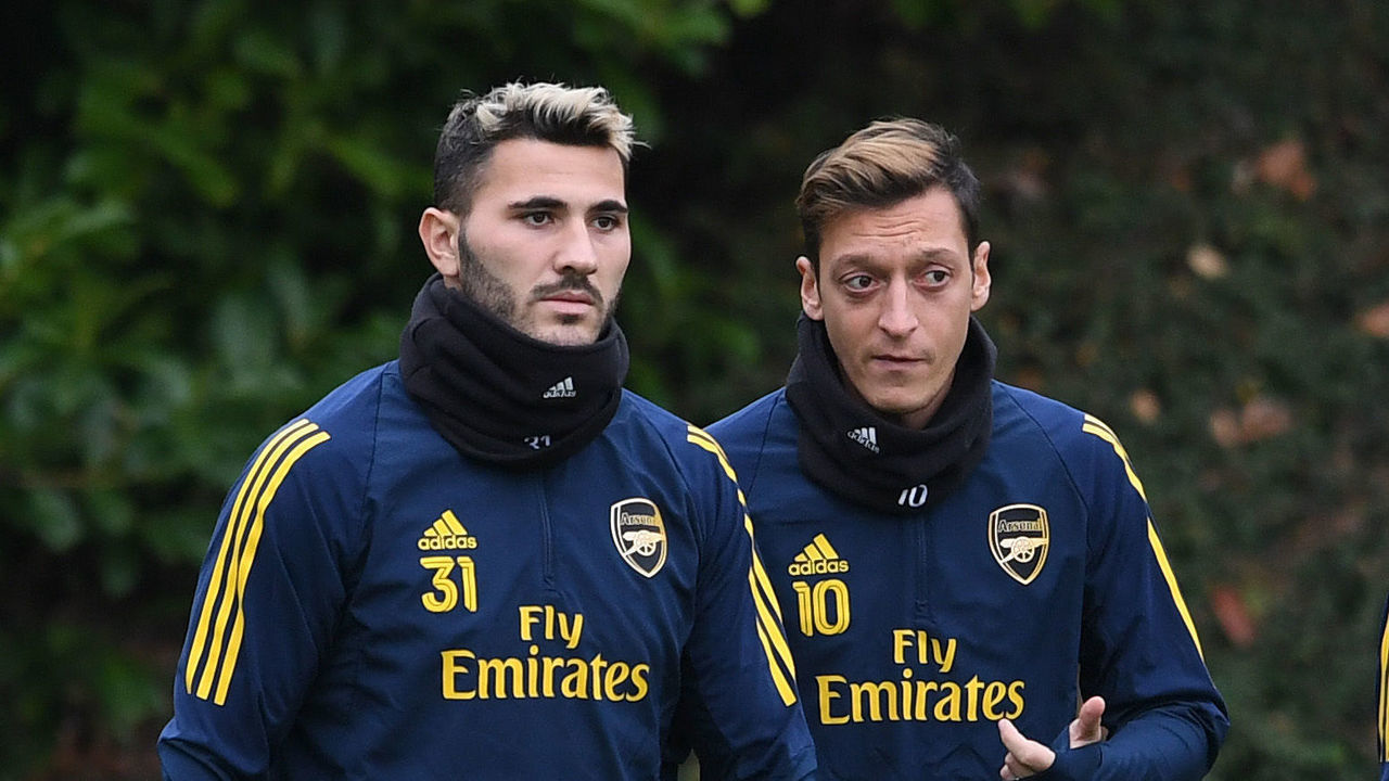 ST ALBANS, ENGLAND - OCTOBER 23: Sead Kolasinac, Mesut Ozil and Shkodran Mustafi of Arsenal during the Arsenal Training Session at London Colney on October 23, 2019 in St Albans, England.