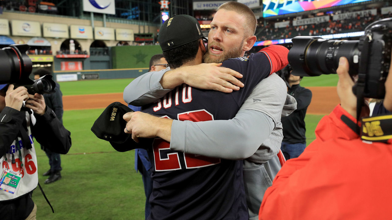 HOUSTON, TEXAS - OCTOBER 30: Juan Soto #22 and Stephen Strasburg #37 of the Washington Nationals celebrate after defeating the Houston Astros 6-2 in Game Seven to win the 2019 World Series in Game Seven of the 2019 World Series at Minute Maid Park on October 30, 2019 in Houston, Texas.