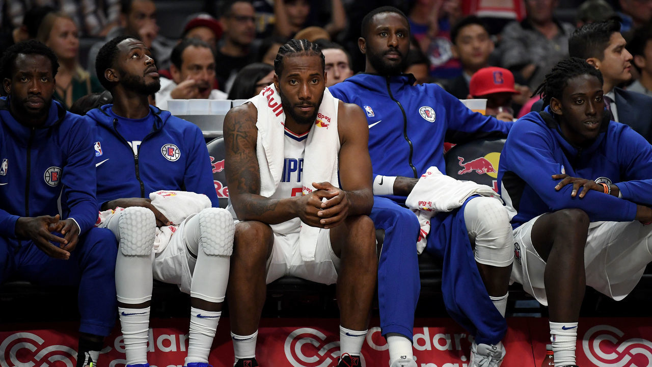 LOS ANGELES, CALIFORNIA - OCTOBER 10: Kawhi Leonard #2 of the LA Clippers on the bench after playing the first half during a 111-91 Denver Nuggets preseason win at Staples Center on October 10, 2019 in Los Angeles, California.