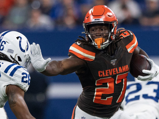 INDIANAPOLIS, IN - AUGUST 17: Cleveland Browns running back Kareem Hunt (27) gives a stiff arm to Indianapolis Colts safety Clayton Geathers (26) during the week 2 NFL preseason game between the Cleveland Browns and the Indianapolis Colts on August 17, 2019 at Lucas Oil Stadium, in Indianapolis, IN.