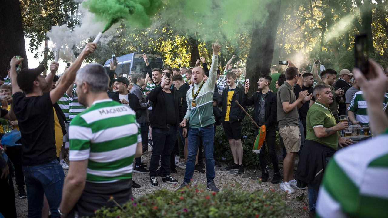 ROME, ITALY - NOVEMBER 7: Celtic supporters shout slogans as they gather near Piazza del Popolo ahead of the Europa League match between S.S. Lazio against Celtic F.C. on November 7, 2019 in Rome, Italy. Two Celtic football fans were stabbed in the leg by masked men outside the Flann O'Brien Irish pub last night. Lazio Football Club has right-wing leanings and its fans are known for their violence. Guidlines have been issued to Celtic fans by Rome Police advising them not to wear football colours in the street. Celtic play Lazio in a Europa League match tonight.