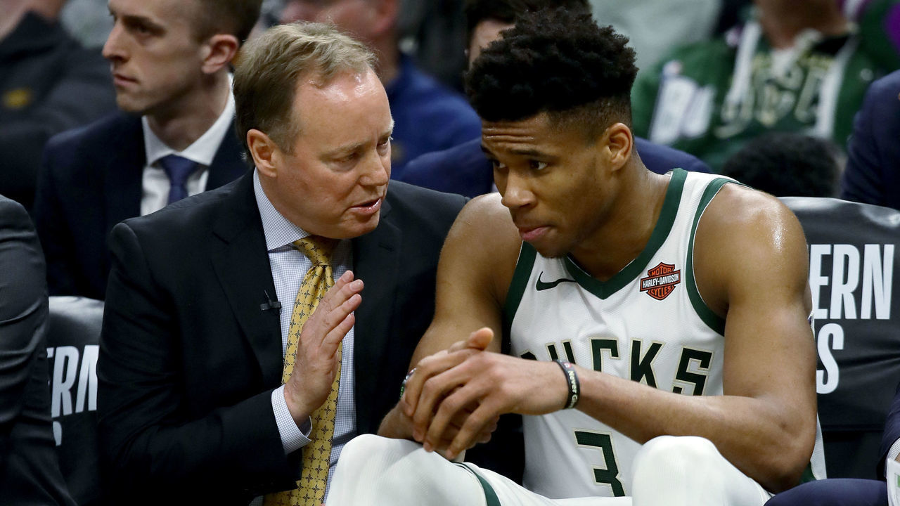 MILWAUKEE, WISCONSIN - MAY 17: Head coach Mike Budenholzer of the Milwaukee Bucks meets with Giannis Antetokounmpo #34 in the third quarter against the Toronto Raptors during Game Two of the Eastern Conference Finals of the 2019 NBA Playoffs at the Fiserv Forum on May 17, 2019 in Milwaukee, Wisconsin.
