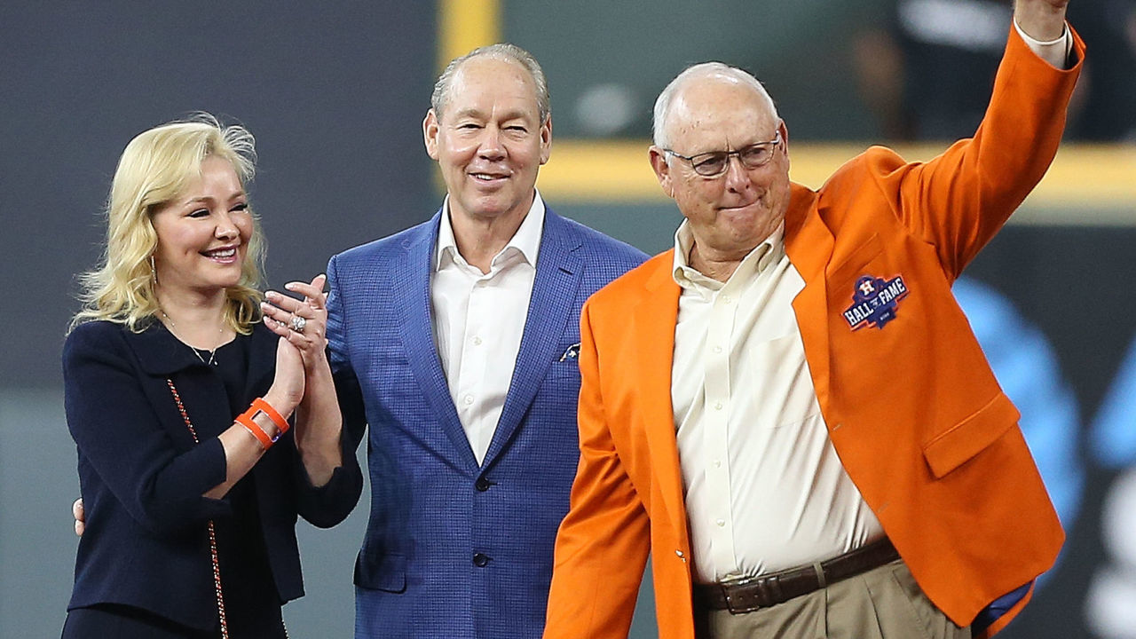 HOUSTON, TEXAS - AUGUST 03: Former Houston Astro pitcher Nolan Ryan waves to the crowd along with Houston Astros owner Jim Crane and wife Whitney during the inaugural 2019 Houston Astros Hall of Fame at Minute Maid Park on August 03, 2019 in Houston, Texas.