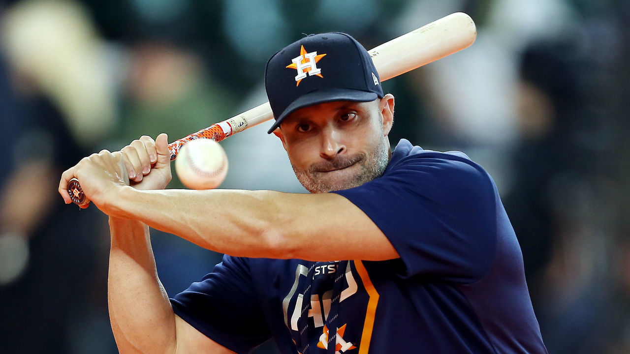 HOUSTON, TEXAS - OCTOBER 13: Joe Espada #19 of the Houston Astros hits a ball before game two of the American League Championship Series against the New York Yankees at Minute Maid Park on October 13, 2019 in Houston, Texas.