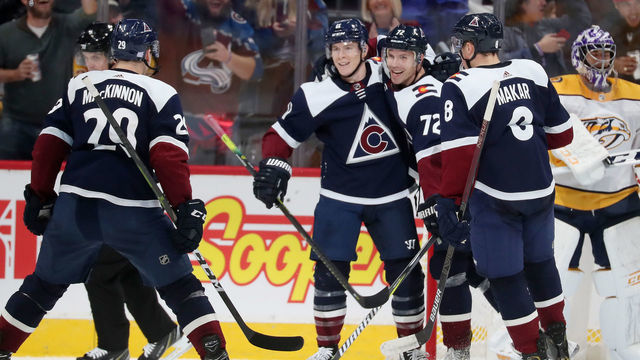 DENVER, COLORADO - NOVEMBER 07: Matt Calvert #11 of the Colorado Avalanche celebrates a goal against the Nashville Predators with teammates Nathan MacKinnon #29, Joonas Donskoi #72 and Cale Makar #8 at Pepsi Center on November 07, 2019 in Denver, Colorado.