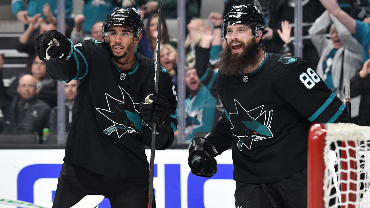 SAN JOSE, CA - NOVEMBER 07: Evander Kane #9 and Brent Burns #88 of the San Jose Sharks celebrate after scoring a goal against the Minnesota Wild at SAP Center on November 7, 2019 in San Jose, California.