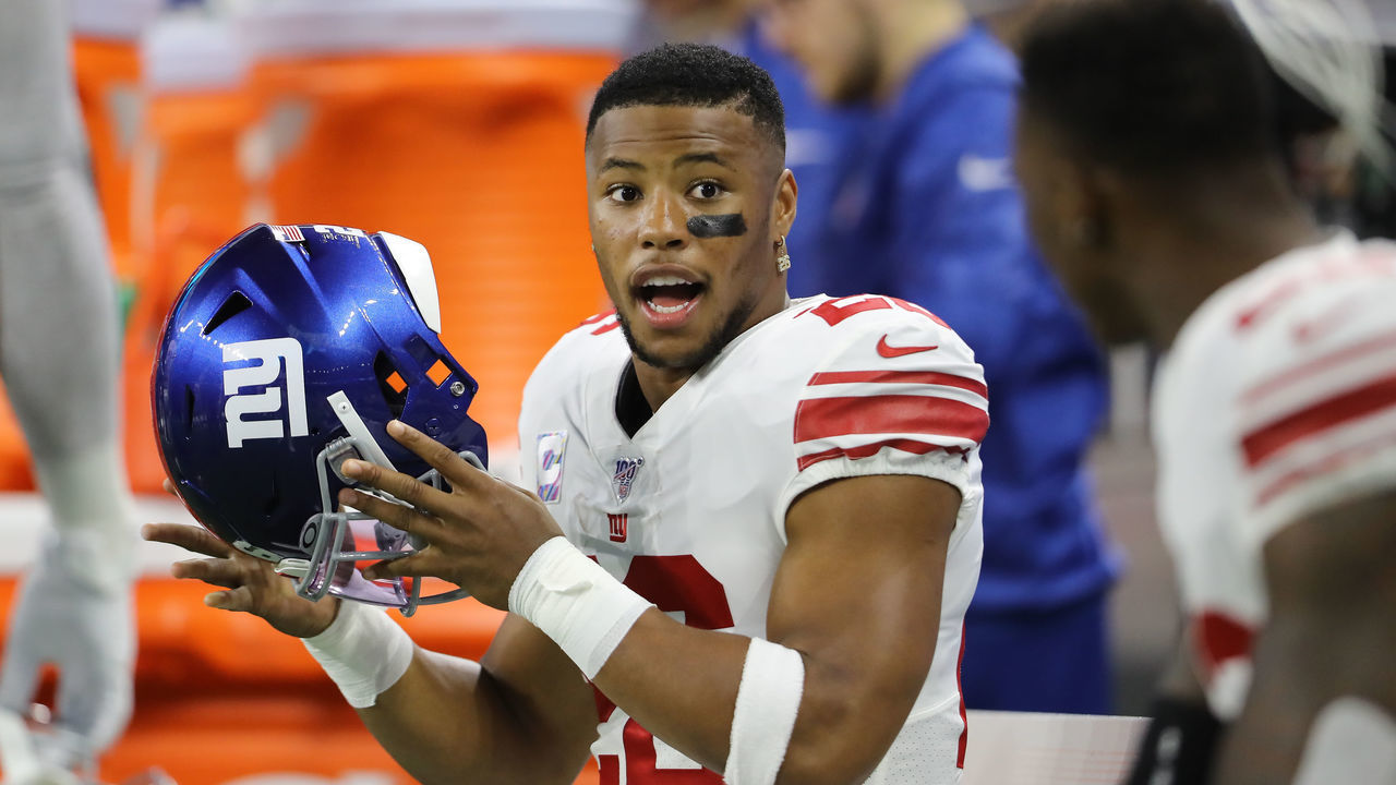 DETROIT, MI - OCTOBER 27: Saquon Barkley #26 of the New York Giants on the bench prior to the start of the game against the Detroit Lions at Ford Field on October 27, 2019 in Detroit, Michigan.