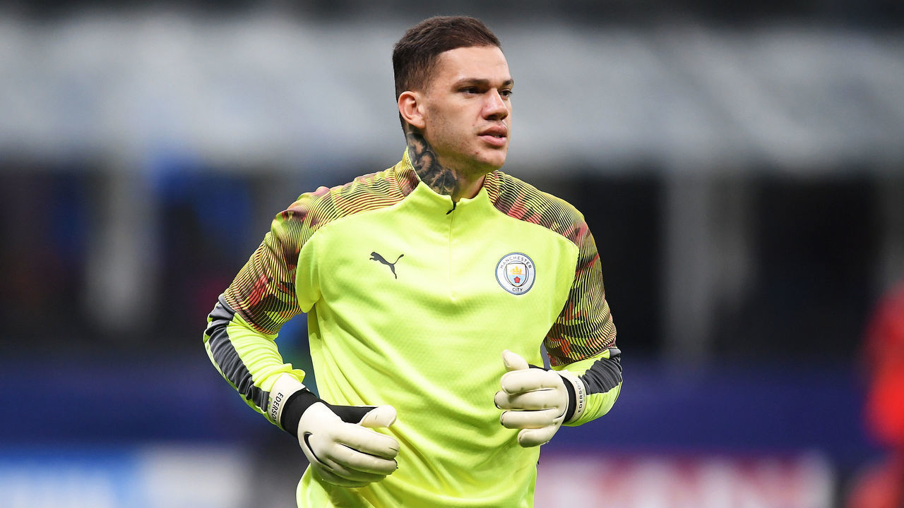 MILAN, ITALY - NOVEMBER 06: Ederson of Manchester City warms up ahead of the UEFA Champions League group C match between Atalanta and Manchester City at Stadio Giuseppe Meazza on November 06, 2019 in Milan, Italy.