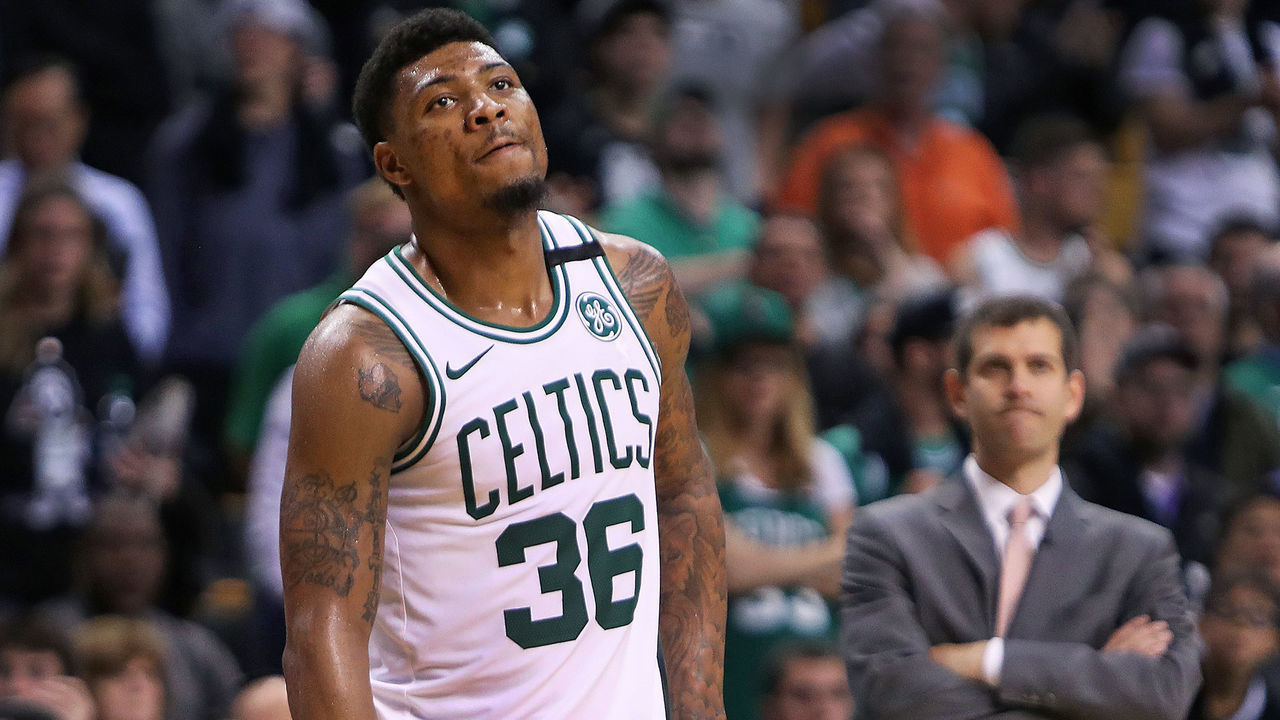 BOSTON, MA - MAY 27: As the final seconds tick off the clock, Boston Celtics Marcus Smart (36) and head coach Brad Stevens (background right) react. The Boston Celtics hosted the Cleveland Cavaliers for Game Seven of their NBA Eastern Conference Finals playoff series at TD Garden in Boston on May 27, 2018.