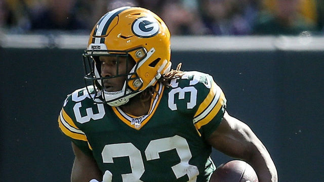 GREEN BAY, WISCONSIN - OCTOBER 20: Aaron Jones #33 of the Green Bay Packers runs with the ball in the second quarter against the Oakland Raiders at Lambeau Field on October 20, 2019 in Green Bay, Wisconsin.