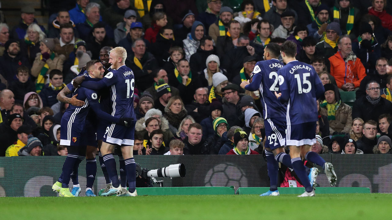 NORWICH, ENGLAND - NOVEMBER 08: Andre Gray of Watford celebrates with his teammates after scoring his sides second goal during the Premier League match between Norwich City and Watford FC at Carrow Road on November 08, 2019 in Norwich, United Kingdom.