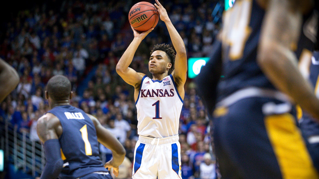 LAWRENCE, KS - NOVEMBER 08: Kansas Jayhawks guard Devon Dotson (1) puts up a shot during the college basketball game against the UNC-Greensboro Spartans on November 8, 2019 at Allen Fieldhouse in Lawrence, Kansas.