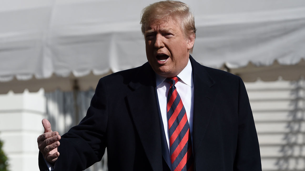 US President Donald Trump speaks to members of the media on the South Lawn of the White House in Washington DC as he departs for Tuscaloosa, Alabama on November 9, 2019. - Trump and First Lady Melania are attending the Louisiana State University Tigers vs. Alabama Crimson Tide Football Game.