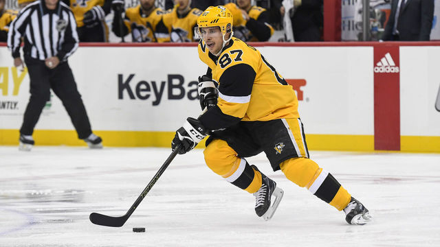 PITTSBURGH, PA - NOVEMBER 09: Pittsburgh Penguins Center Sidney Crosby (87) skates with the puck during the first period in the NHL game between the Pittsburgh Penguins and the Chicago Blackhawks on November 9, 2019, at PPG Paints Arena in Pittsburgh, PA.