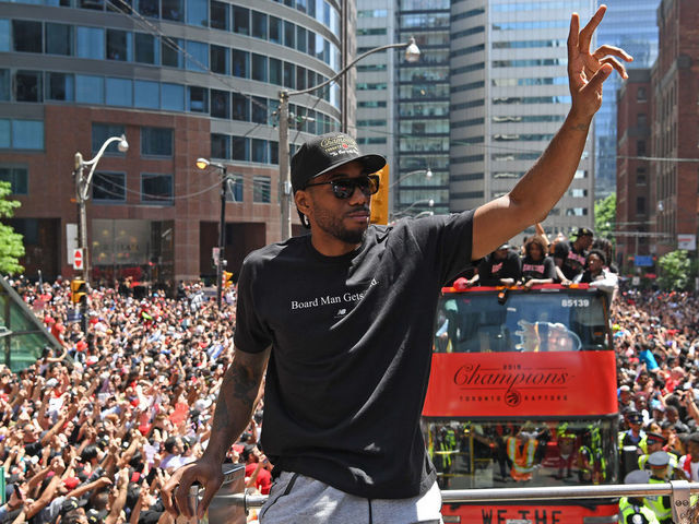 TORONTO, ON - JUNE 17: Kawhi Leonard #2 of the Toronto Raptors acknowledges the crowd during the Toronto Raptors Championship Victory Parade on June 17, 2019 in Toronto, Ontario. NOTE TO USER: User expressly acknowledges and agrees that, by downloading and/or using this photograph, user is consenting to the terms and conditions of Getty Images License Agreement. Mandatory Copyright Notice: Copyright 2019 NBAE