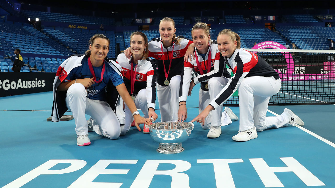 PERTH, AUSTRALIA - NOVEMBER 10: Caroline Garcia, Alize Cornet, Kristina Mladenovic, Pauline Parmentier and Fiona Ferro of France pose with the Fed Cup in the 2019 Fed Cup Final tie between Australia and France at RAC Arena on November 10, 2019 in Perth, Australia.