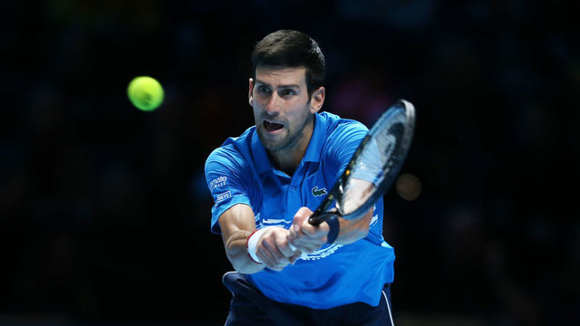 LONDON, ENGLAND - NOVEMBER 10: Novak Djokovic in action during his Group Bjorn Borg match against Matteo Berrettini during Day 1 of the Nitto ATP World Tour Finals at The O2 Arena on November 10, 2019 in London, England.