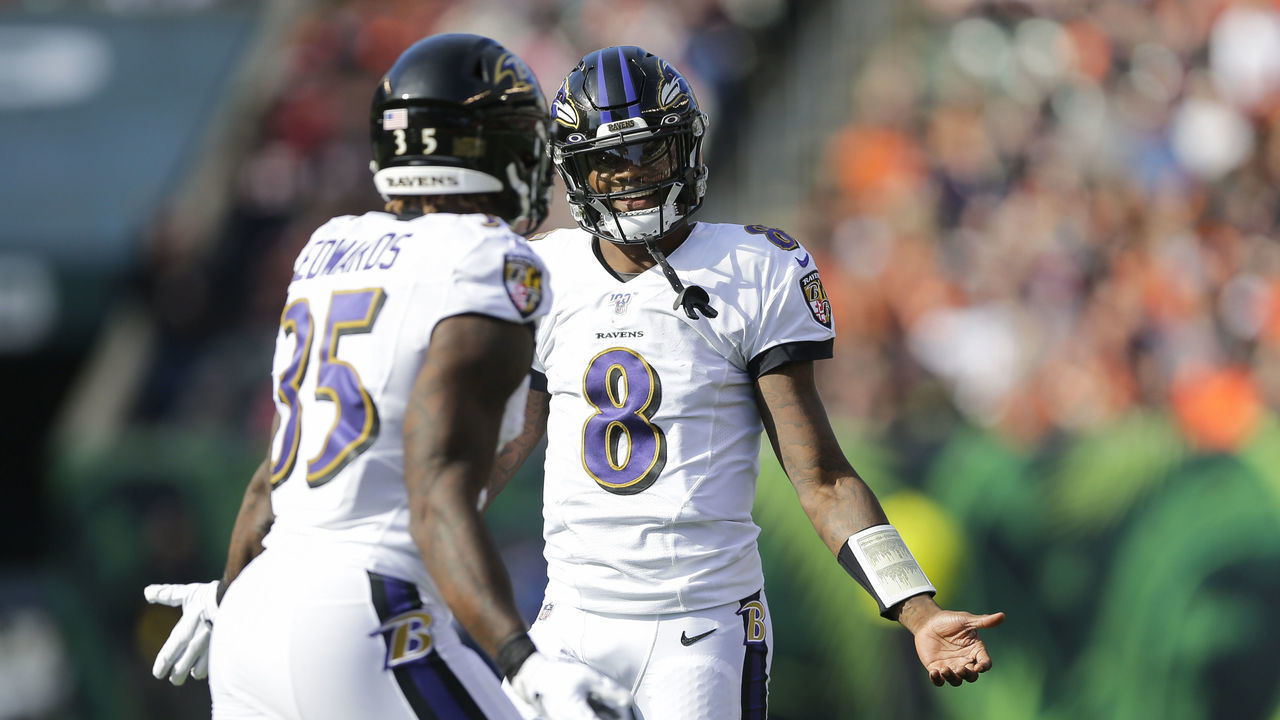 CINCINNATI, OHIO - NOVEMBER 10: Lamar Jackson #8 of the Baltimore Ravens celebrates scoring a touchdown against the Cincinnati Bengals during the first quarter of the game at Paul Brown Stadium on November 10, 2019 in Cincinnati, Ohio.
