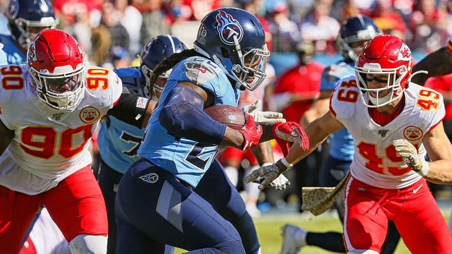 NASHVILLE, TENNESSEE - NOVEMBER 10: Derrick Henry #22 of the Tennessee Titans rushes against the Kansas City Chiefs during the first half at Nissan Stadium on November 10, 2019 in Nashville, Tennessee.