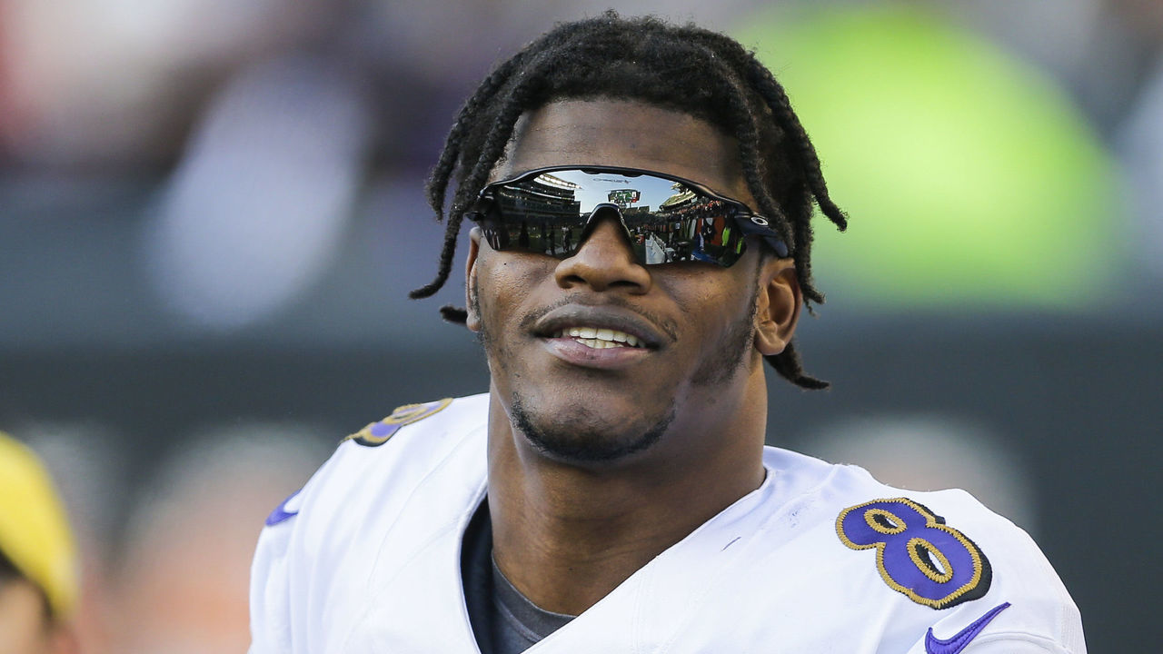 CINCINNATI, OHIO - NOVEMBER 10: Lamar Jackson #8 of the Baltimore Ravens wears sunglasses on the sideline during the fourth quarter of the game against the Cincinnati Bengals at Paul Brown Stadium on November 10, 2019 in Cincinnati, Ohio.