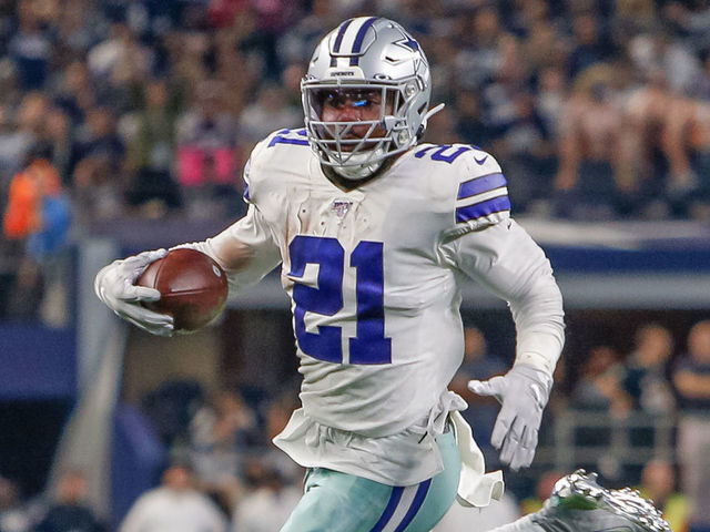ARLINGTON, TX - OCTOBER 20: Dallas Cowboys Running Back Ezekiel Elliott (21) rushes with the ball during the game between the Philadelphia Eagles and Dallas Cowboys on October 20, 2019 at AT&T Stadium in Arlington, TX.