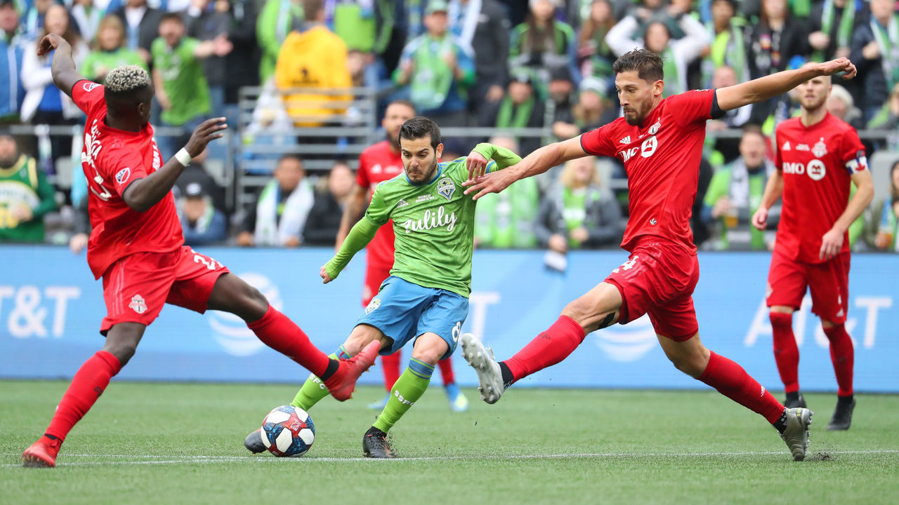 SEATTLE, WASHINGTON - NOVEMBER 10: Victor Rodriguez #8 of the Seattle Sounders kicks the ball to score a goal in the second half to give the Seattle Sounders a 2-0 lead against Toronto FC during the 2019 MLS Cup at CenturyLink Field on November 10, 2019 in Seattle, Washington.