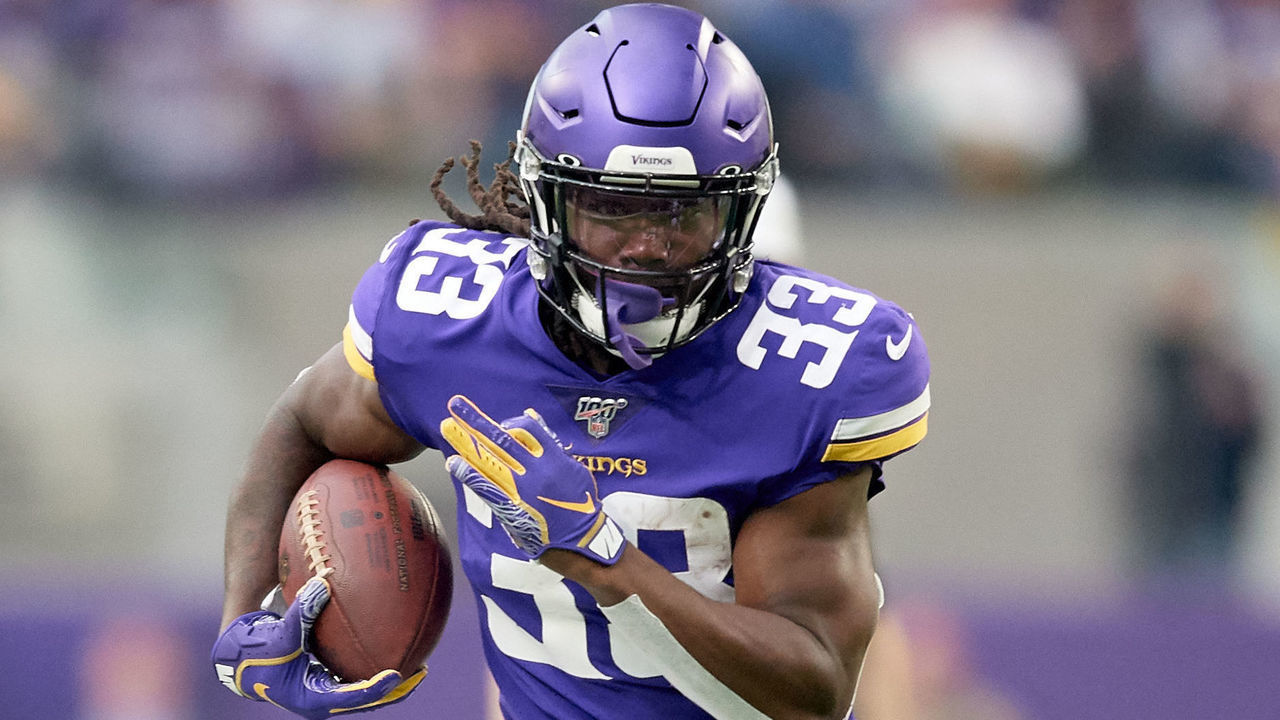 MINNEAPOLIS, MINNESOTA - OCTOBER 13: Dalvin Cook #33 of the Minnesota Vikings carries the ball against the Philadelphia Eagles during the game at U.S. Bank Stadium on October 13, 2019 in Minneapolis, Minnesota. The Vikings defeated the Eagles 38-20.