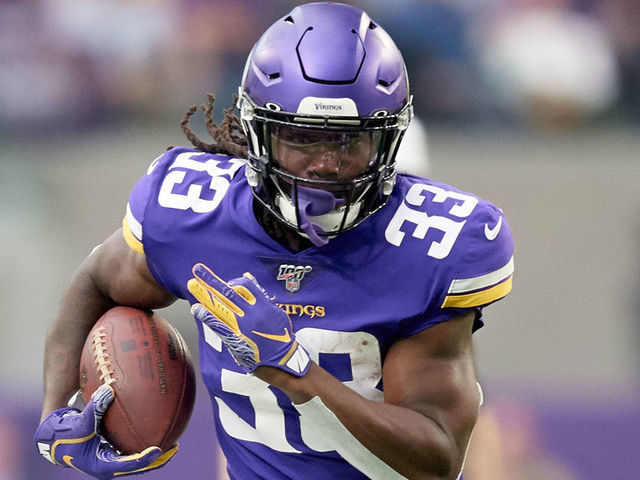 MINNEAPOLIS, MINNESOTA - OCTOBER 13: Dalvin Cook #33 of the Minnesota Vikings carries the ball against the Philadelphia Eagles during the game at U.S. Bank Stadium on October 13, 2019 in Minneapolis, Minnesota. The Vikings defeated the Eagles 38-20.