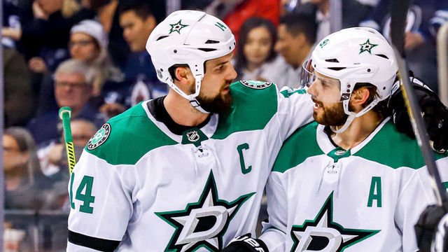 WINNIPEG, MB - MARCH 25: Jamie Benn #14 and Tyler Seguin #91 of the Dallas Stars celebrate a third period goal against the Winnipeg Jets at the Bell MTS Place on March 25, 2019 in Winnipeg, Manitoba, Canada.