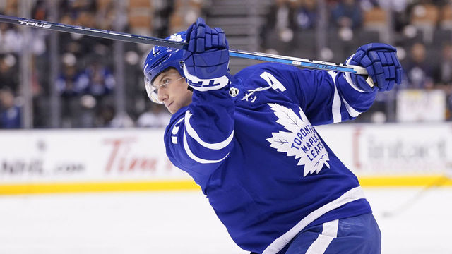 TORONTO, ON - NOVEMBER 7: Toronto Maple Leafs center Mitchell Marner #16 takes a shot during warm ups against the Vegas Golden Knights at the Scotiabank Arena on November 7, 2019 in Toronto, Ontario, Canada.