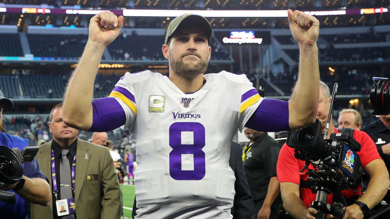 ARLINGTON, TEXAS - NOVEMBER 10: Kirk Cousins #8 of the Minnesota Vikings pumps his fists as he heads to the locker room after the win over the Dallas Cowboys at AT&T Stadium on November 10, 2019 in Arlington, Texas.