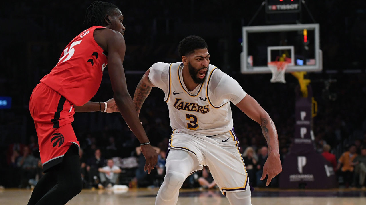 LOS ANGELES, CALIFORNIA - NOVEMBER 10: Anthony Davis #3 of the Los Angeles Lakers loses his dribble in front of Chris Boucher #25 of the Toronto Raptors during a 113-104 Raptors win at Staples Center on November 10, 2019 in Los Angeles, California. NOTE TO USER: Pascal Siakam #43 of the Toronto Raptors reacts after a Los Angeles Lakers turnover during a 113-104 Raptors win at Staples Center on November 10, 2019 in Los Angeles, California. NOTE TO USER: User expressly acknowledges and agrees that, by downloading and/or using this photograph, user is consenting to the terms and conditions of the Getty Images License Agreement.