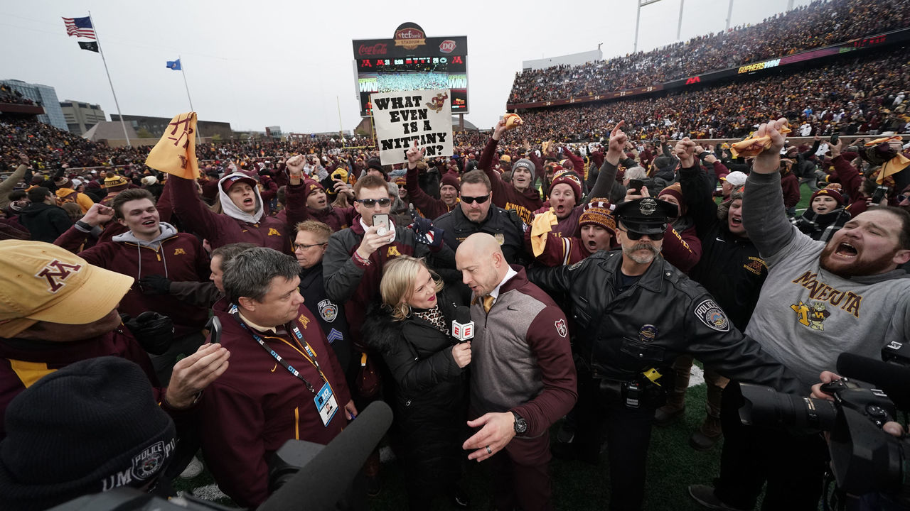 MINNEAPOLIS, MN - NOVEMBER 9: Minnesota Golden Gophers head coach P.J. Fleck was swarmed by fans after defeating Penn State in an NCAA college football game on Saturday, Nov. 9, 2019 at TCF Bank Stadium in Minneapolis, Minn.