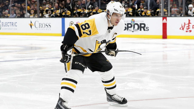 BOSTON, MA - NOVEMBER 04: Pittsburgh Penguins center Sidney Crosby (87) waits to move in for the draw during a game between the Boston Bruins and the Pittsburgh Penguins on November 4, 2019, at TD Garden in Boston, Massachusetts.