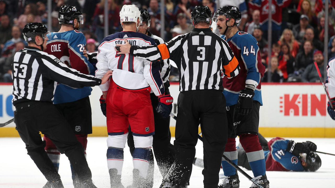 DENVER, COLORADO - NOVEMBER 09: Nick Foligno #71 of the Columbus Blue Jackets is separated from Mark Barberio #44 and Ian Cole #28 of the Colorado Avalanche after a collision with Pierre-Edouard Bellemare #41 at the Pepsi Center on November 9, 2019 in Denver, Colorado.