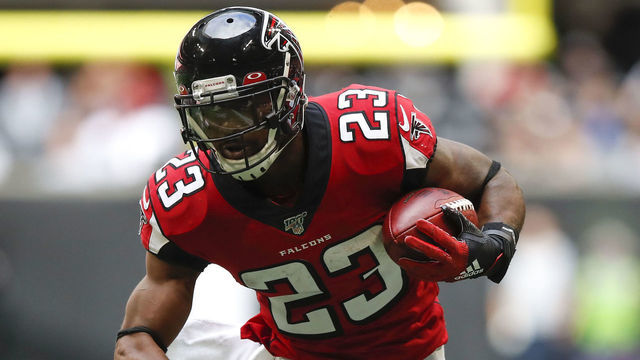 ATLANTA, GA - OCTOBER 20: Brian Hill #23 of the Atlanta Falcons rushes in the second half of an NFL game against the Los Angeles Rams at Mercedes-Benz Stadium on October 20, 2019 in Atlanta, Georgia.