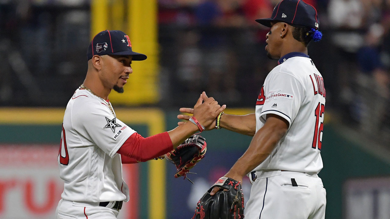 CLEVELAND, OHIO - JULY 09: Francisco Lindor #12 of the Cleveland Indians and Mookie Betts #50 of the Boston Red Sox participate in the 2019 MLB All-Star Game at Progressive Field on July 09, 2019 in Cleveland, Ohio.