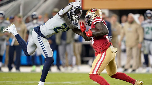 SANTA CLARA, CALIFORNIA - NOVEMBER 11: Wide receiver Deebo Samuel #19 of the San Francisco 49ers carries the ball against the defense of cornerback Tre Flowers #21 of the Seattle Seahawks during the game at Levi's Stadium on November 11, 2019 in Santa Clara, California.