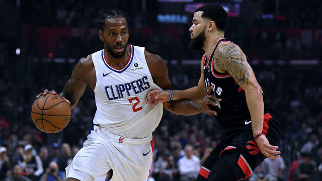 LOS ANGELES, CALIFORNIA - NOVEMBER 11: Kawhi Leonard #2 of the LA Clippers drives on Fred VanVleet #23 of the Toronto Raptors during a 98-88 Clippers win at Staples Center on November 11, 2019 in Los Angeles, California. NOTE TO USER: User expressly acknowledges and agrees that, by downloading and/or using this photograph, user is consenting to the terms and conditions of the Getty Images License Agreement.