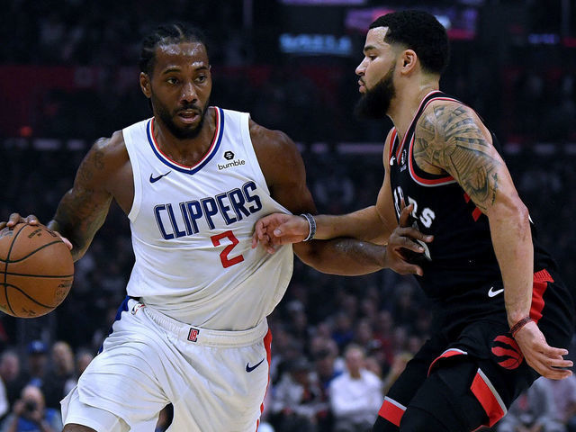 LOS ANGELES, CALIFORNIA - NOVEMBER 11: Kawhi Leonard #2 of the LA Clippers drives on Fred VanVleet #23 of the Toronto Raptors during a 98-88 Clippers win at Staples Center on November 11, 2019 in Los Angeles, California. NOTE TO USER: User expressly acknowledges and agrees that, by downloading and/or using this photograph, user is consenting to the terms and conditions of the Getty Images License Agreement.