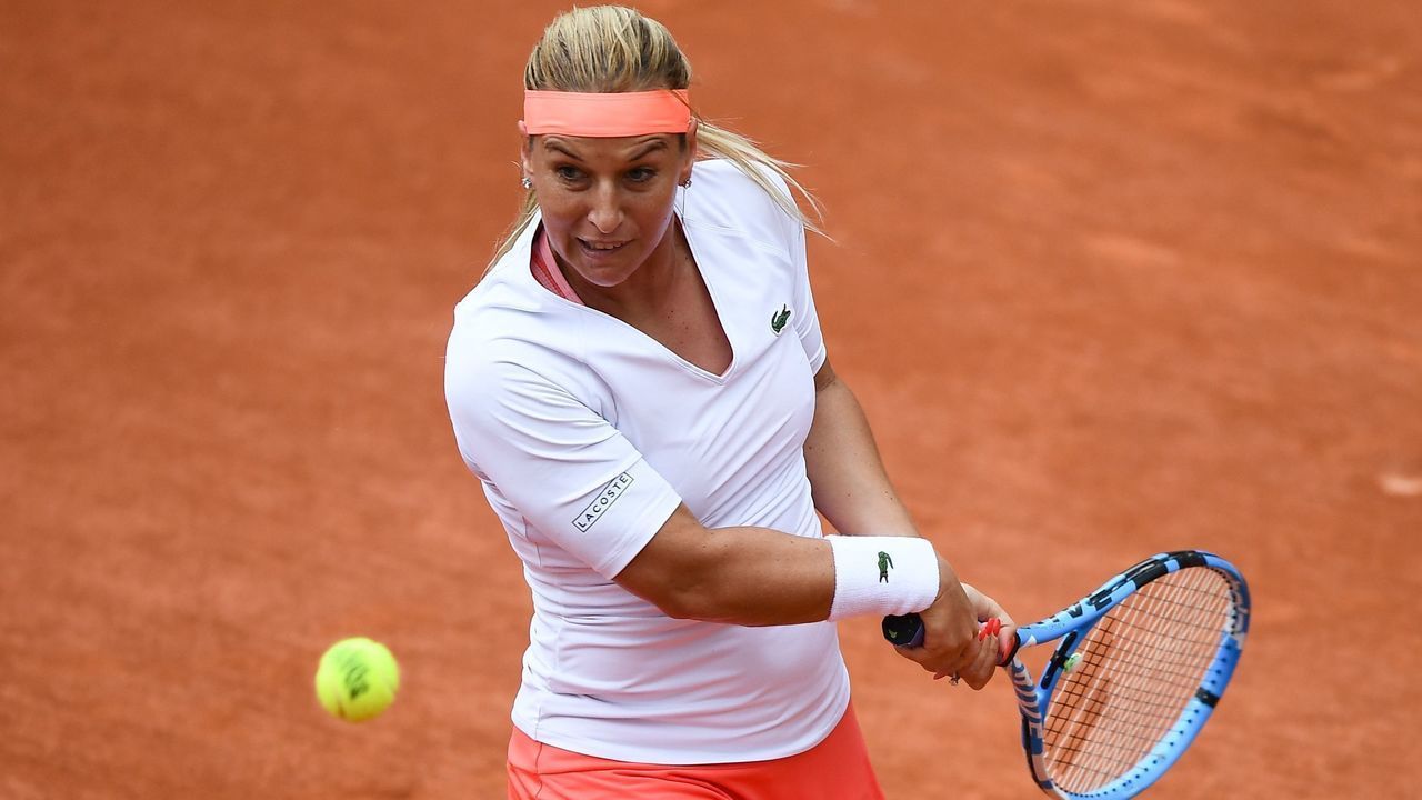 Slovakia's Dominika Cibulkova plays a backhand return to Belarus' Aryna Sabalenka during their women's singles first round match on day three of The Roland Garros 2019 French Open tennis tournament in Paris on May 28, 2019.