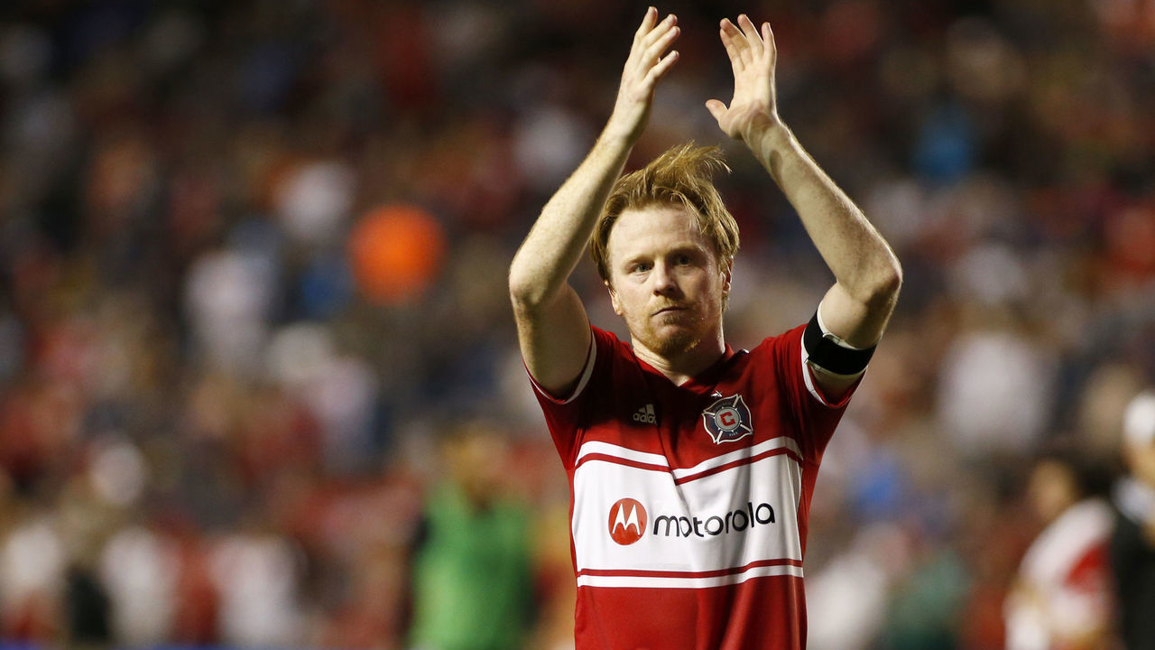 BRIDGEVIEW, ILLINOIS - JULY 03: Dax McCarty #6 of the Chicago Fire waves to the fans after a victory over the Atlanta United FC at SeatGeek Stadium on July 03, 2019 in Bridgeview, Illinois.