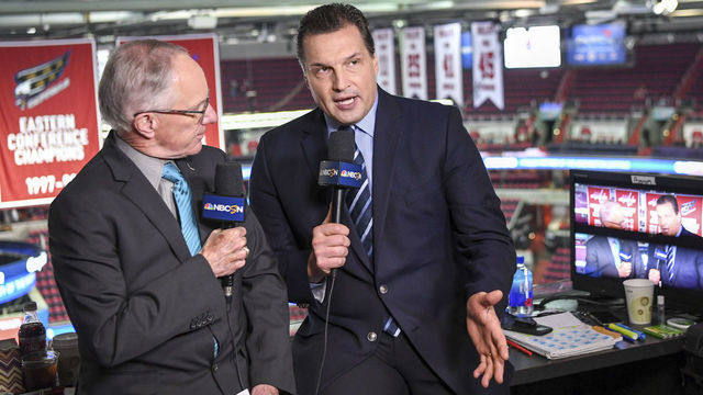 WASHINGTON, DC - MAY 15: NBC hockey commentator Eddie Olczyk (R) talks with Michael "Doc" Emrick as they do the pregame prior to action between the Tampa Bay Lightning and the Washington Capitals during the Eastern Conference finals.